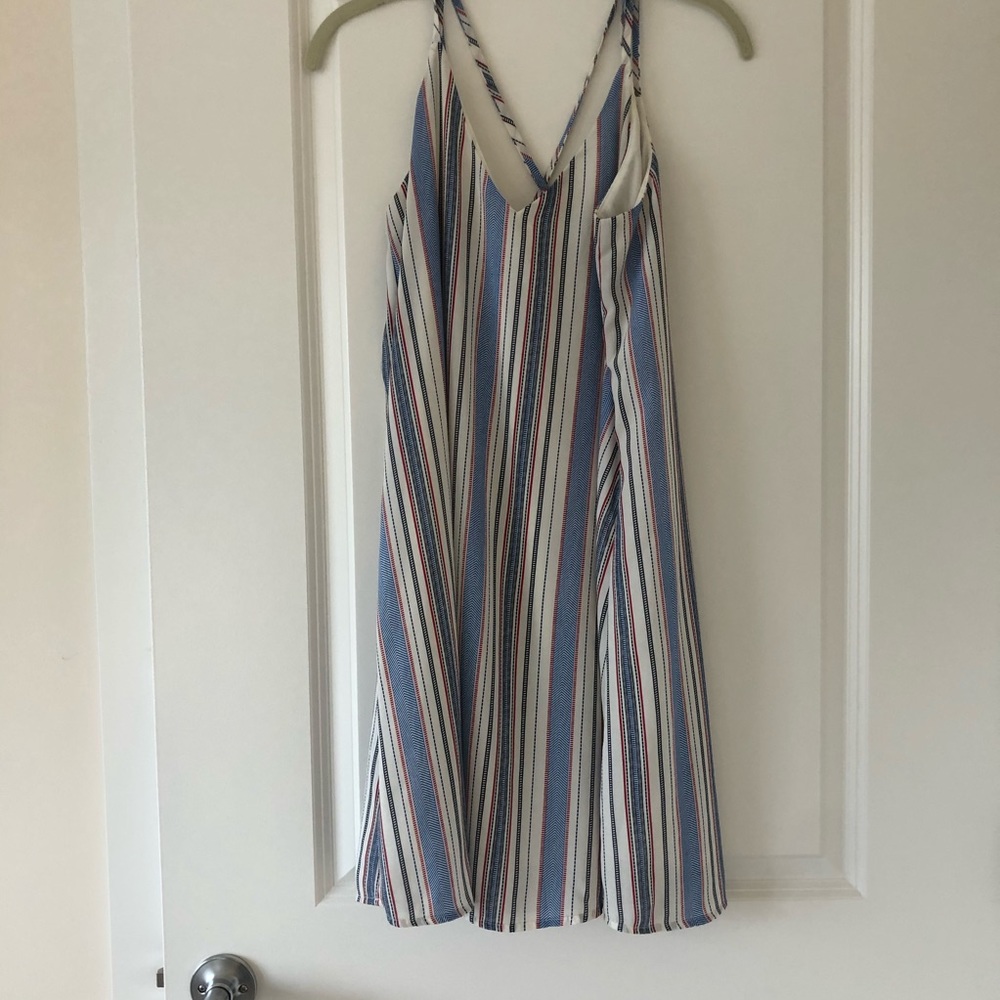 Striped dress with crossed back straps